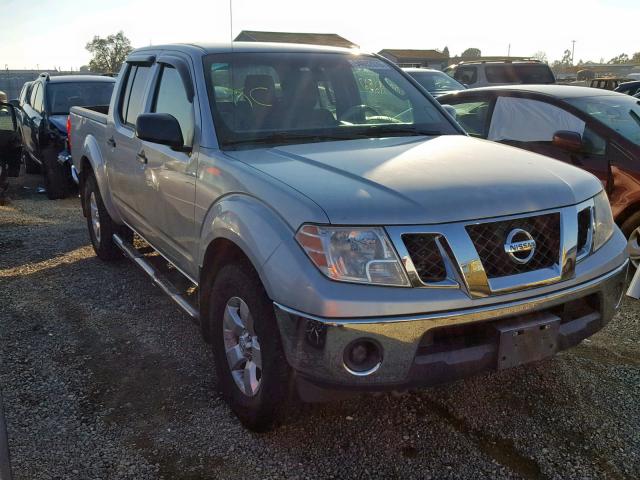 1N6AD07W69C425198 - 2009 NISSAN FRONTIER C SILVER photo 1