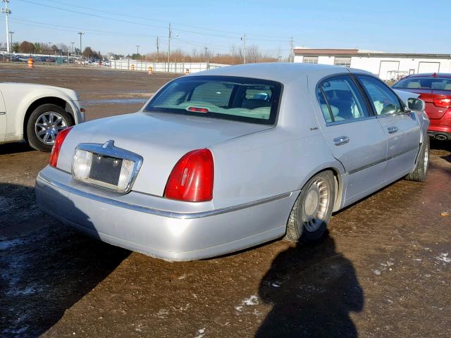 1LNHM81WXYY908523 - 2000 LINCOLN TOWN CAR E SILVER photo 4