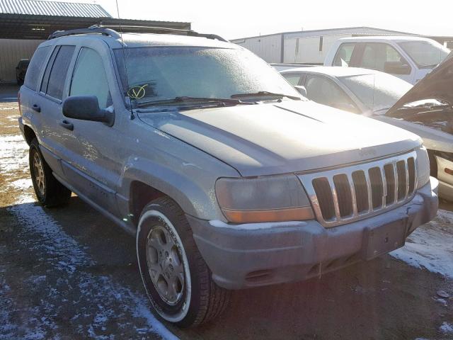 1J4GW48S7YC137998 - 2000 JEEP GRAND CHER GRAY photo 1