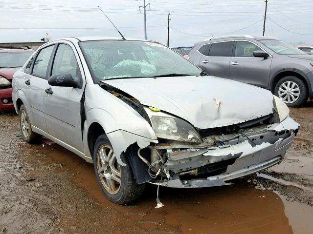 1FAFP34N15W276727 - 2005 FORD FOCUS ZX4 SILVER photo 1