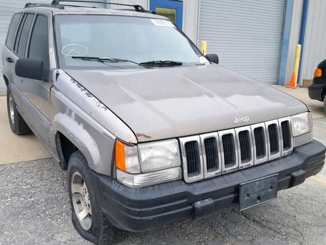 1J4GZ58S6VC691042 - 1997 JEEP GRAND CHER GOLD photo 1