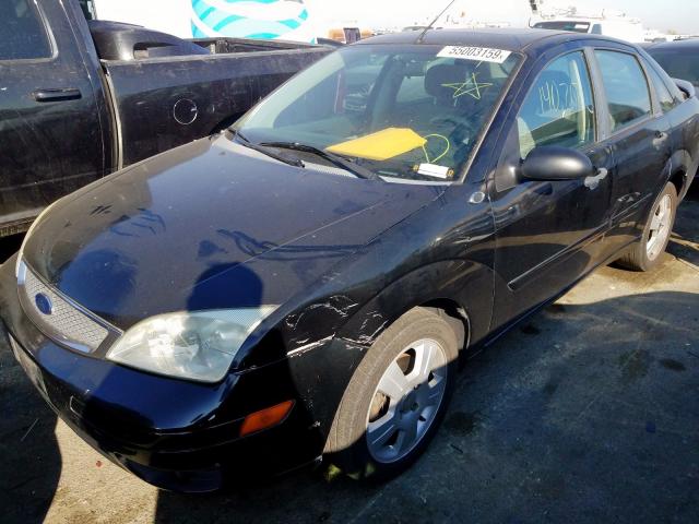 1FAHP34NX7W354823 - 2007 FORD FOCUS ZX4 BLACK photo 2