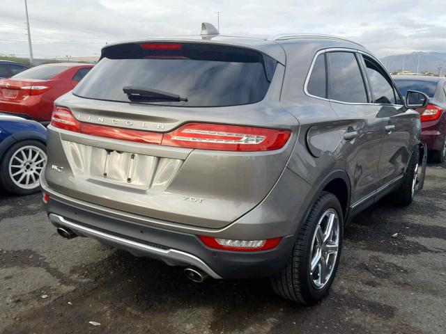 5LMCJ1C96HUL21077 - 2017 LINCOLN MKC PREMIE GRAY photo 4