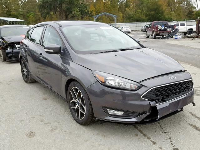1FADP3M22HL274486 - 2017 FORD FOCUS SEL GRAY photo 1