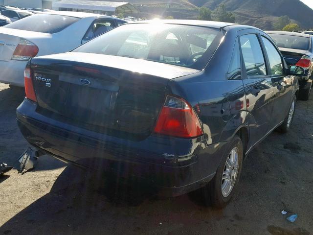 1FAFP34N77W200450 - 2007 FORD FOCUS ZX4 BLACK photo 4