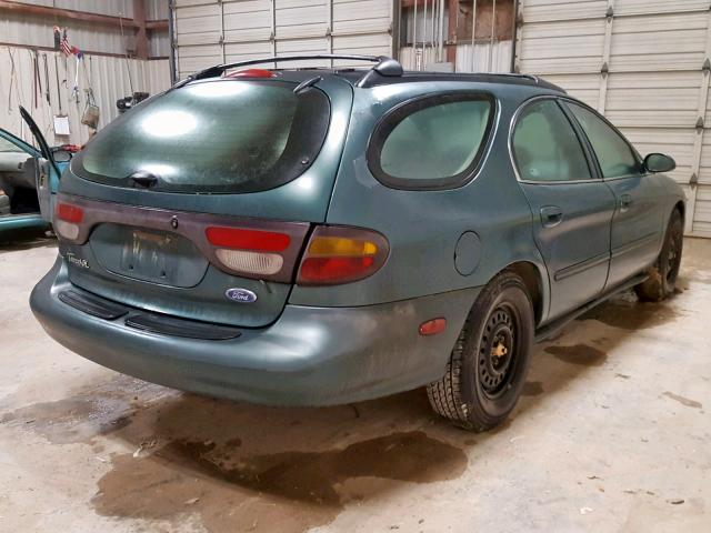 1FALP57U8VA235574 - 1997 FORD TAURUS GL GREEN photo 4