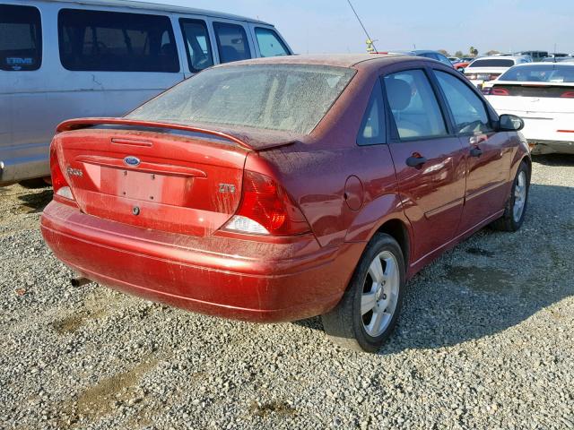 1FAFP38Z73W206983 - 2003 FORD FOCUS ZTS RED photo 4