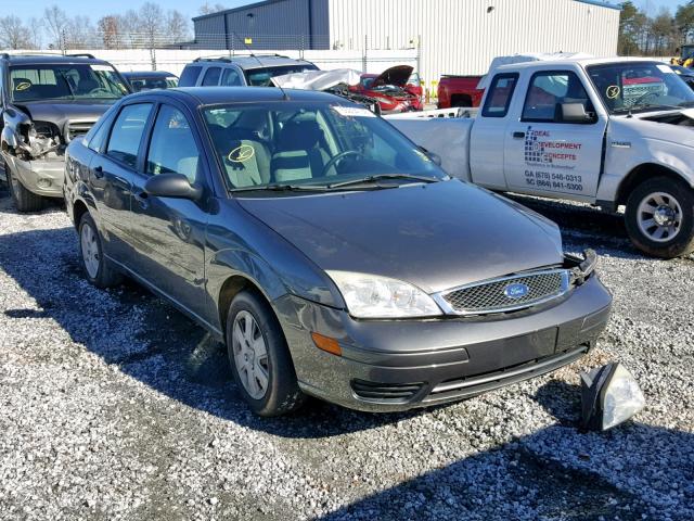 1FAHP34N27W226124 - 2007 FORD FOCUS ZX4 GRAY photo 1