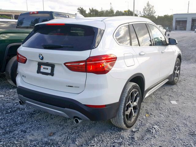 WBXHU7C38J3F04565 - 2018 BMW X1 SDRIVE2 Blanc photo 4