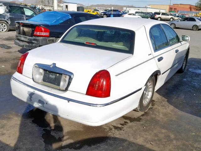 1LNHM81W1XY674173 - 1999 LINCOLN TOWN CAR E WHITE photo 4