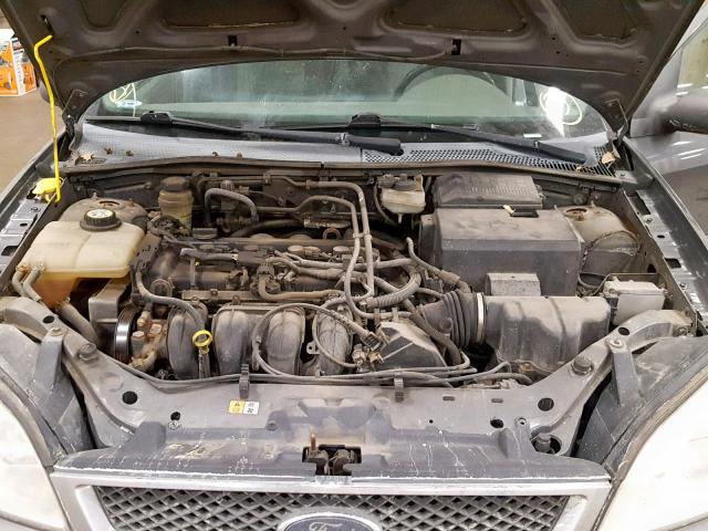 1FAFP34N75W224938 - 2005 FORD FOCUS ZX4 GRAY photo 7