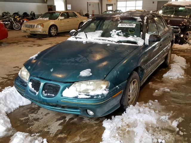 1G2NE52T5VM546969 - 1997 PONTIAC GRAND AM S GREEN photo 2