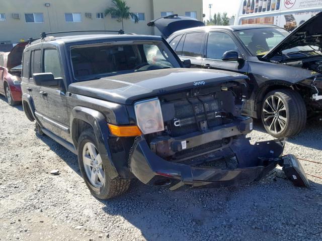 1J8HH48P77C676399 - 2007 JEEP COMMANDER BLACK photo 1