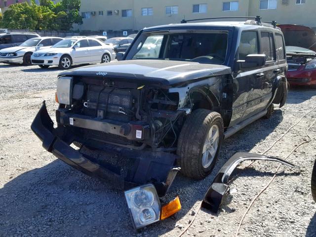 1J8HH48P77C676399 - 2007 JEEP COMMANDER BLACK photo 2