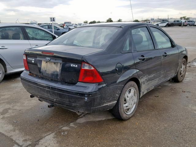 1FAFP34N06W138422 - 2006 FORD FOCUS ZX4 BLACK photo 4