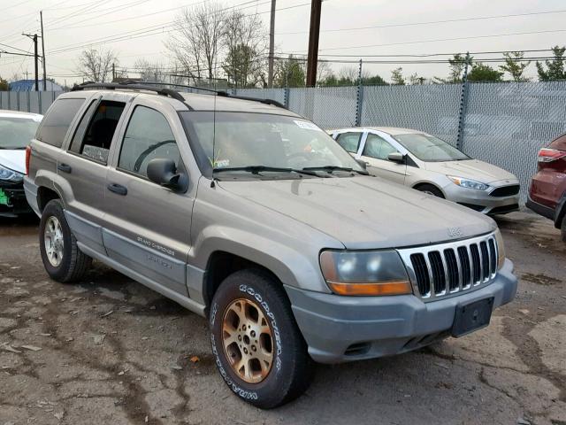 1J4GW58S6XC559166 - 1999 JEEP GRAND CHER GRAY photo 1