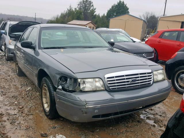 2FAFP74W7XX210139 - 1999 FORD CROWN VICT GRAY photo 1