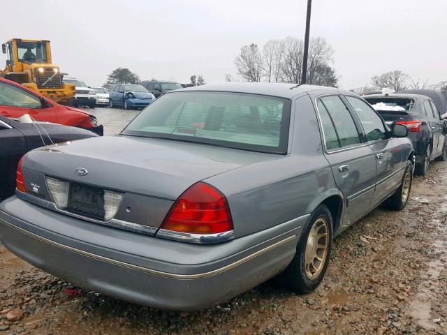 2FAFP74W7XX210139 - 1999 FORD CROWN VICT GRAY photo 4