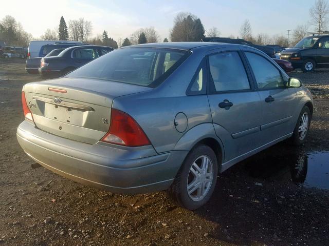 1FAFP34Z73W314364 - 2003 FORD FOCUS SE C GREEN photo 4