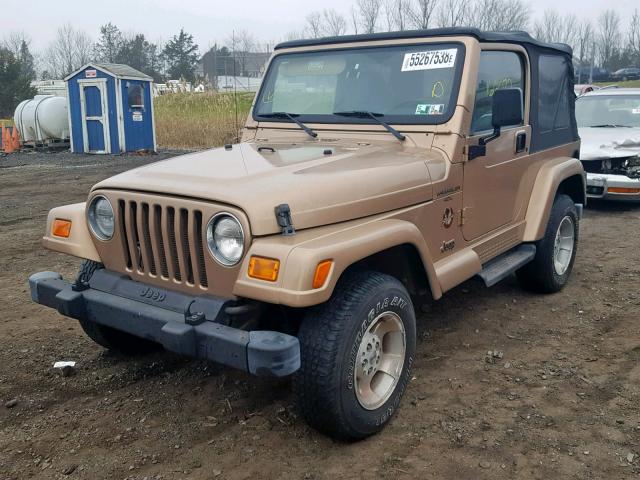 1J4FA59S3YP704196 - 2000 JEEP WRANGLER / TAN photo 2