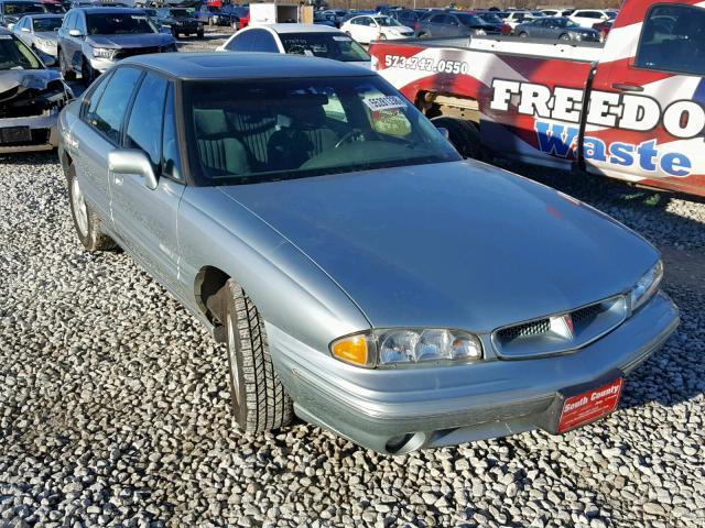 1G2HX52KXVH223590 - 1997 PONTIAC BONNEVILLE BLUE photo 1