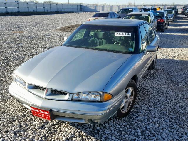 1G2HX52KXVH223590 - 1997 PONTIAC BONNEVILLE BLUE photo 2