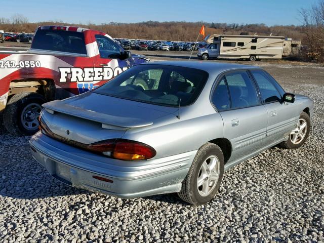 1G2HX52KXVH223590 - 1997 PONTIAC BONNEVILLE BLUE photo 4