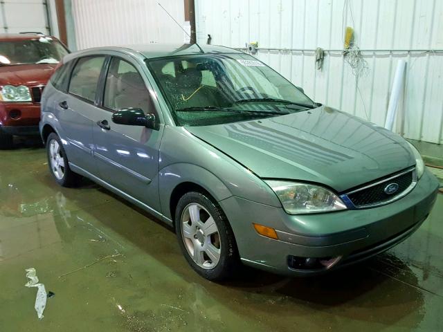 3FAFP37N05R130415 - 2005 FORD FOCUS ZX5 GRAY photo 1