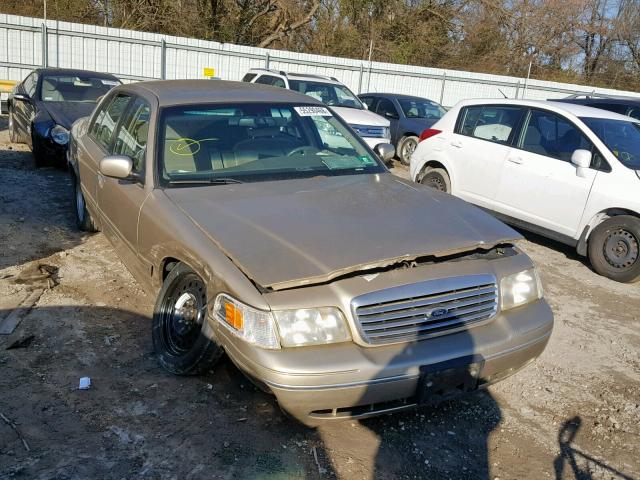 2FAFP74W1XX159088 - 1999 FORD CROWN VICT GOLD photo 1