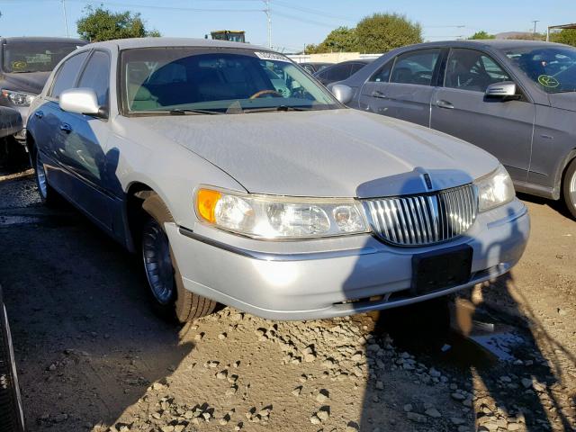 1LNHM83WX1Y637773 - 2001 LINCOLN TOWN CAR C SILVER photo 1