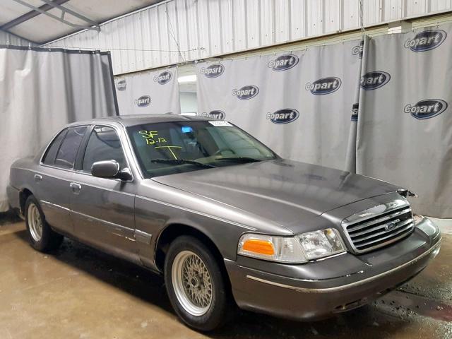 2FAFP73WXXX115091 - 1999 FORD CROWN VICT GRAY photo 1