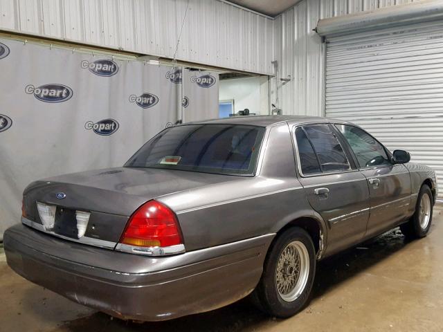 2FAFP73WXXX115091 - 1999 FORD CROWN VICT GRAY photo 4