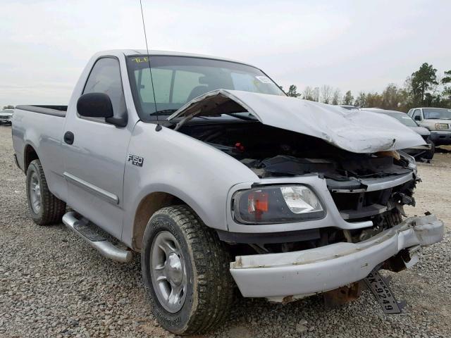 2FTRF17234CA66706 - 2004 FORD F-150 HERI SILVER photo 1