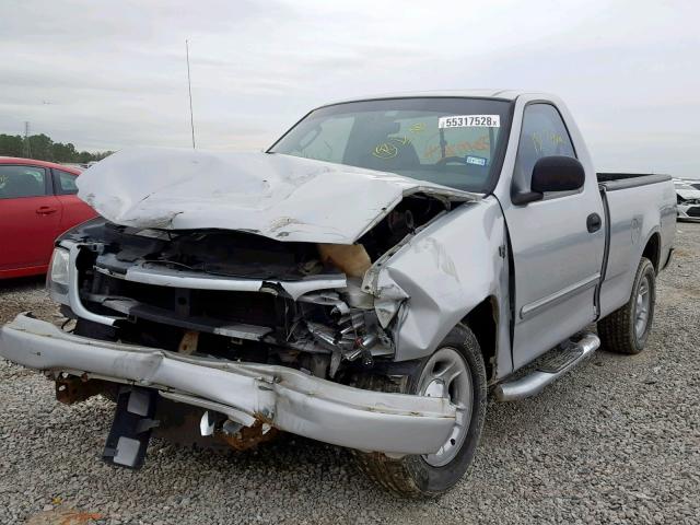 2FTRF17234CA66706 - 2004 FORD F-150 HERI SILVER photo 2