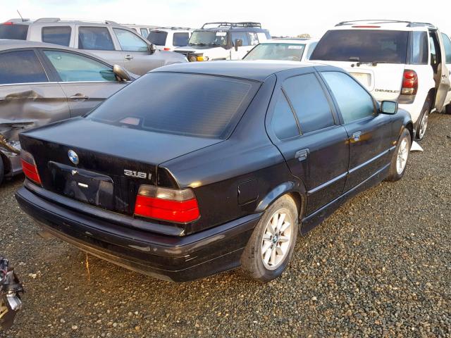 WBACC0324VEK24719 - 1997 BMW 318 I AUTO BLACK photo 4