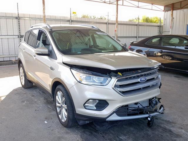 1FMCU0J93HUD04762 - 2017 FORD ESCAPE TIT GOLD photo 1