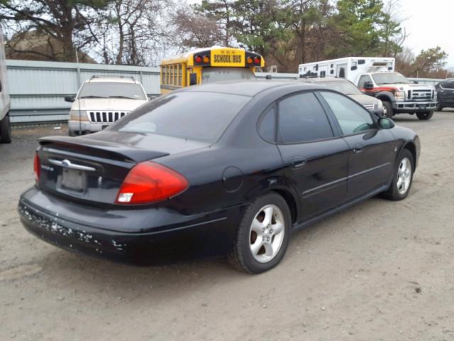 1FAFP55S4YA227426 - 2000 FORD TAURUS SES BLACK photo 4