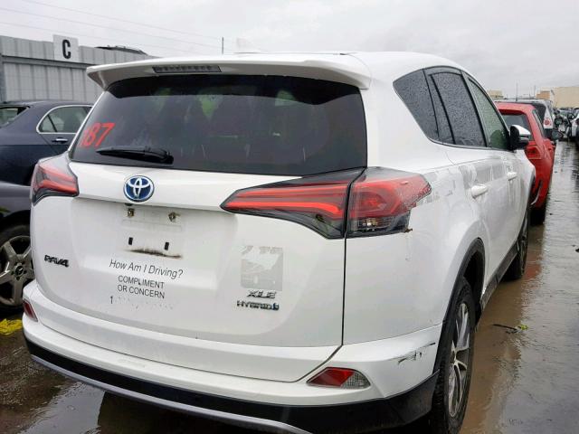 JTMRJREVXHD143572 - 2017 TOYOTA RAV4 HV LE WHITE photo 4