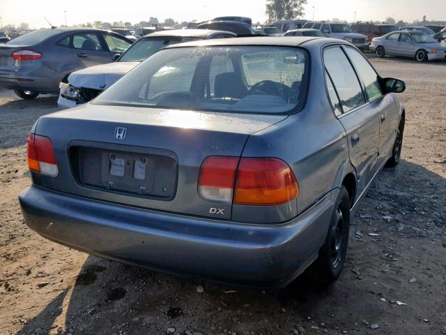 JHMEJ6622WS001502 - 1998 HONDA CIVIC DX GREEN photo 4