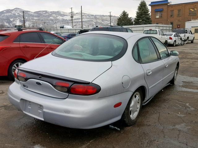 1FAFP53U8XG168882 - 1999 FORD TAURUS SE SILVER photo 4