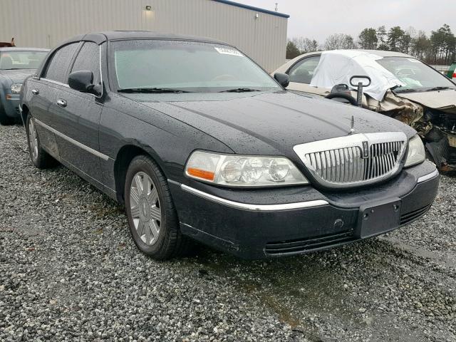 1LNHM83W74Y635340 - 2004 LINCOLN TOWN CAR U BLACK photo 1