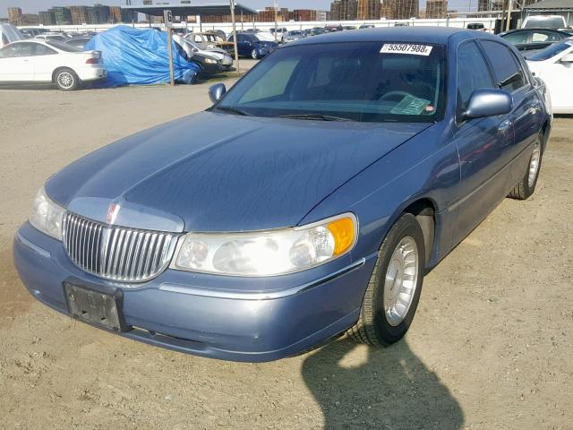 1LNHM81W6XY716790 - 1999 LINCOLN TOWN CAR E BLUE photo 2