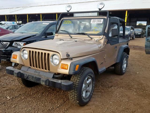 1J4FA29P4YP767530 - 2000 JEEP WRANGLER / BROWN photo 2