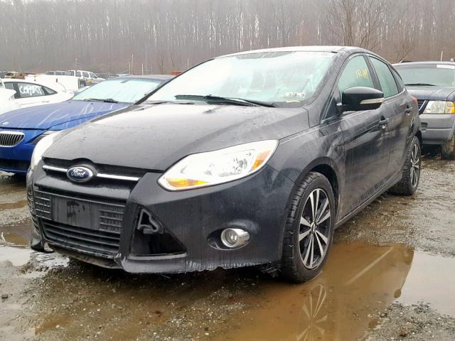 1FAHP3K21CL365908 - 2012 FORD FOCUS SE BLACK photo 2