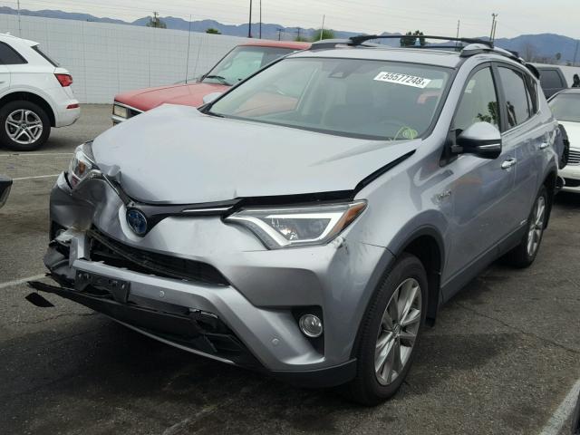 JTMDJREV4JD165826 - 2018 TOYOTA RAV4 HV LI SILVER photo 2