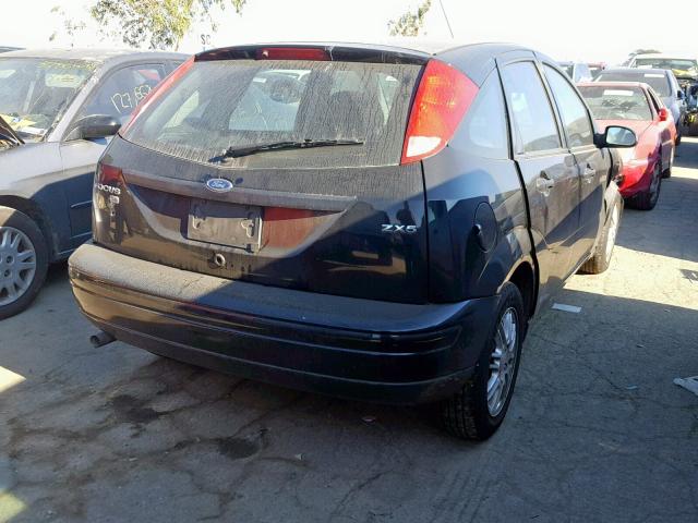 1FAFP37N96W164819 - 2006 FORD FOCUS ZX5 BLACK photo 4