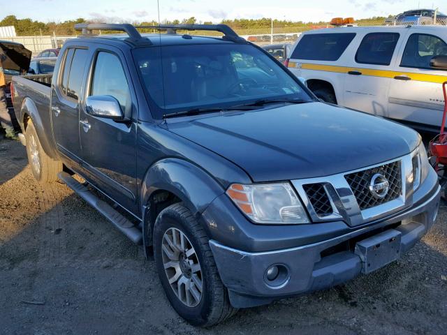 1N6AD09W39C410638 - 2009 NISSAN FRONTIER C GRAY photo 1