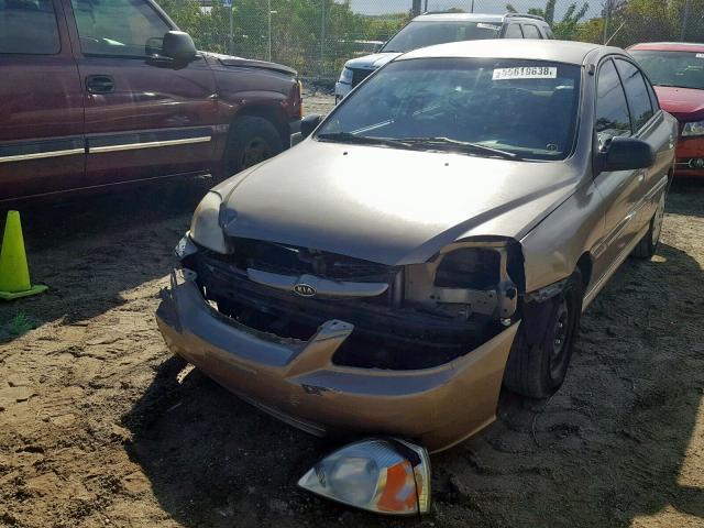 KNADC125256369533 - 2005 KIA RIO GOLD photo 2