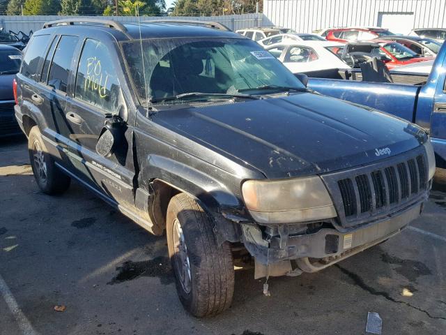 1J4GW48NX4C331428 - 2004 JEEP GRAND CHER BLACK photo 1