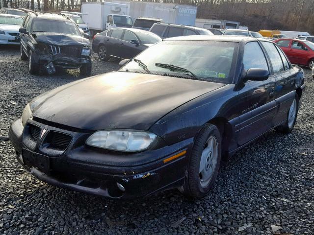 1G2NW52M3VC856081 - 1997 PONTIAC GRAND AM G BLACK photo 2